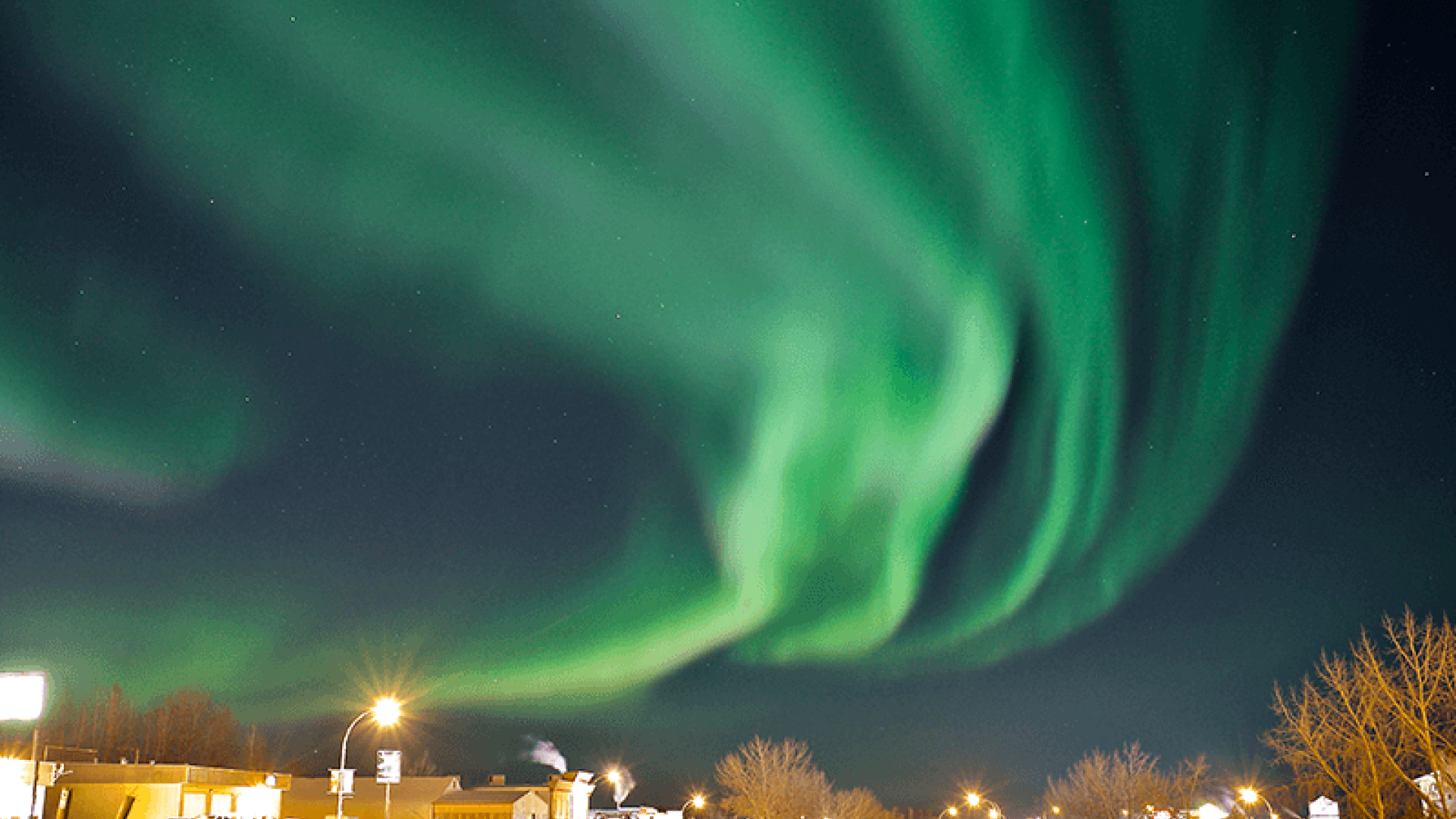 northern lights over Fort Nelson downtown core